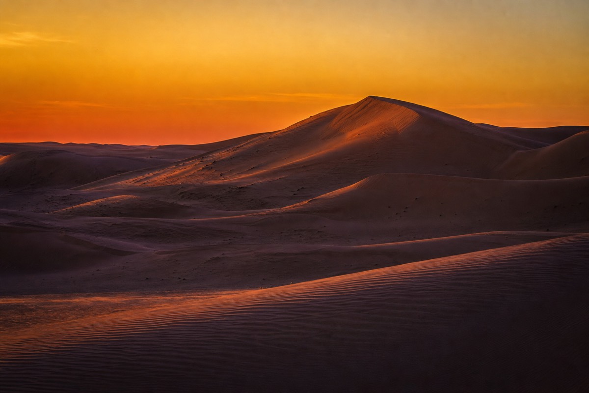 The desert light shifts through the seasons